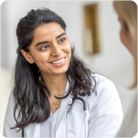 Two female doctors smiling
